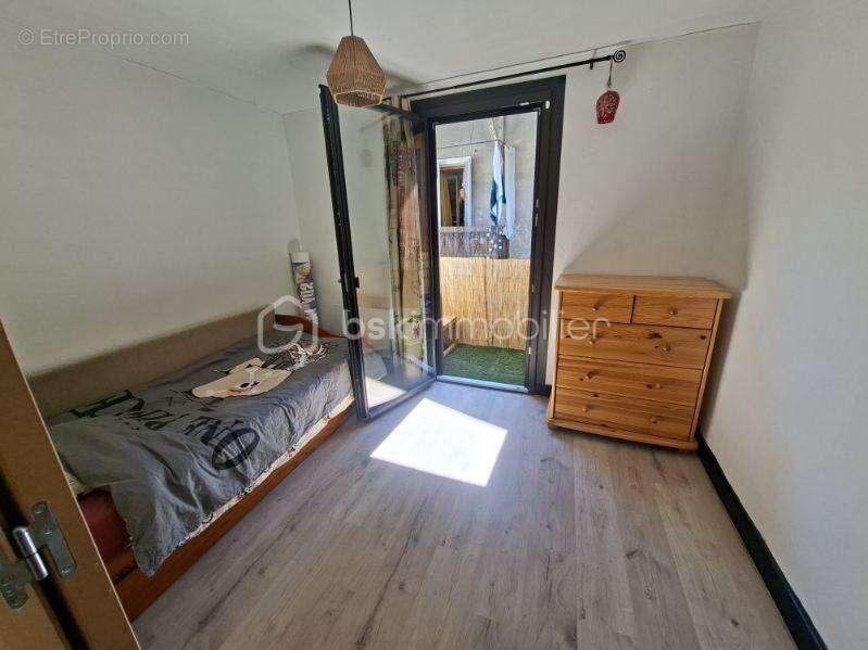 Appartement T4 de 86 m² avec jardin et cave - photo 8