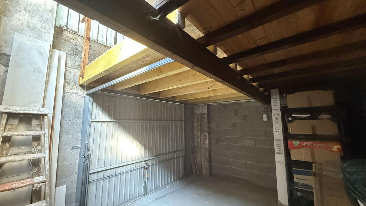 Garage avec espace stockage en mezzanine - photo 2