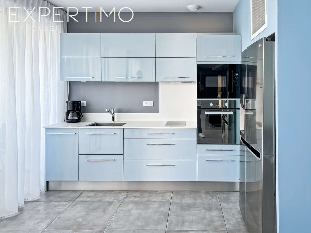 Appartement de Type T3 avec belle terrasse, très beau jardin, deux places de parking, un cellier . - photo 6