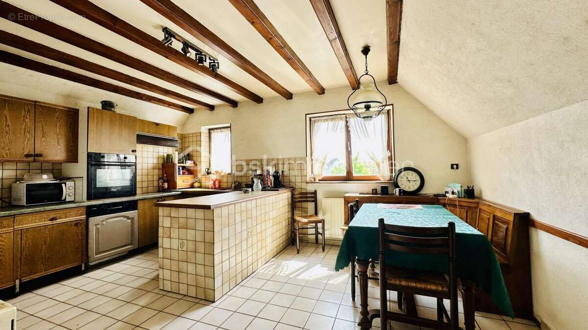 Maison de construction traditionnelle des années 1990 - photo 9