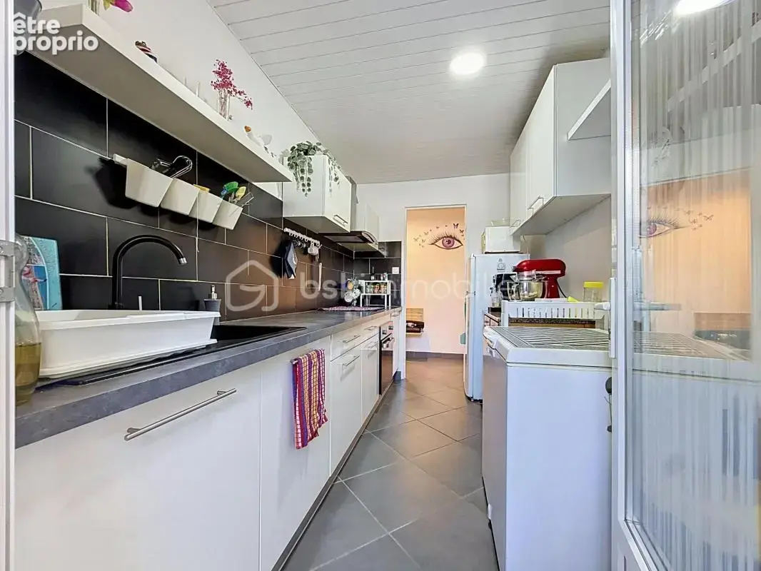 Appartement 3 pièces de 71m2 avec terrasse, parking et cave - photo 6