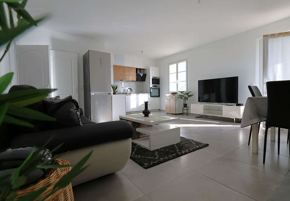 MARCHÉ CENTRAL - Appartement de 61 m² avec balcon & parking - photo 3
