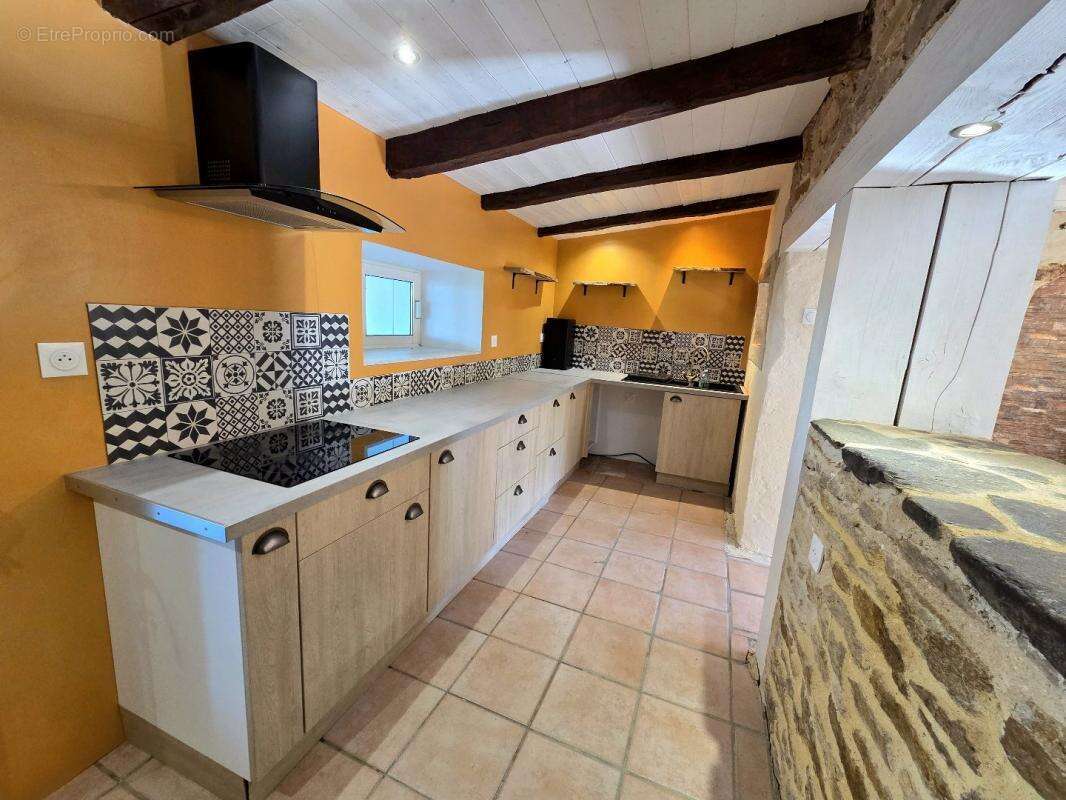 Maison à BARAQUEVILLE