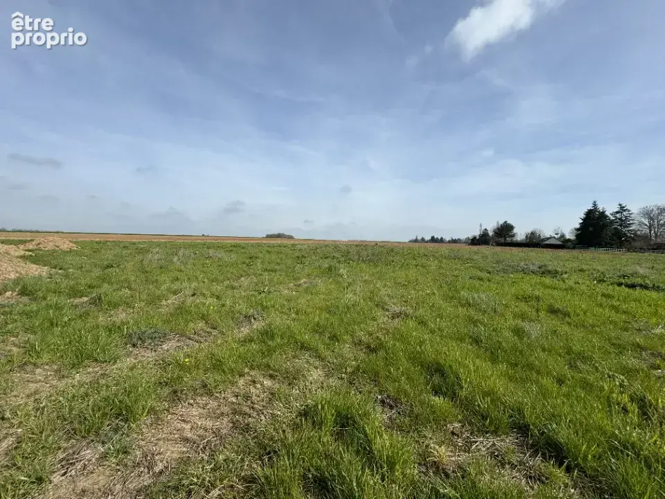 Photo Terrain à Saint-Aubin-Sur-Gaillon au prix de 77 000€