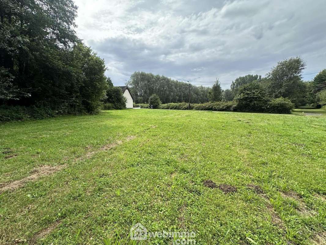 D'une surface de 1276 m² - Terrain à MERLIEUX-ET-FOUQUEROLLES