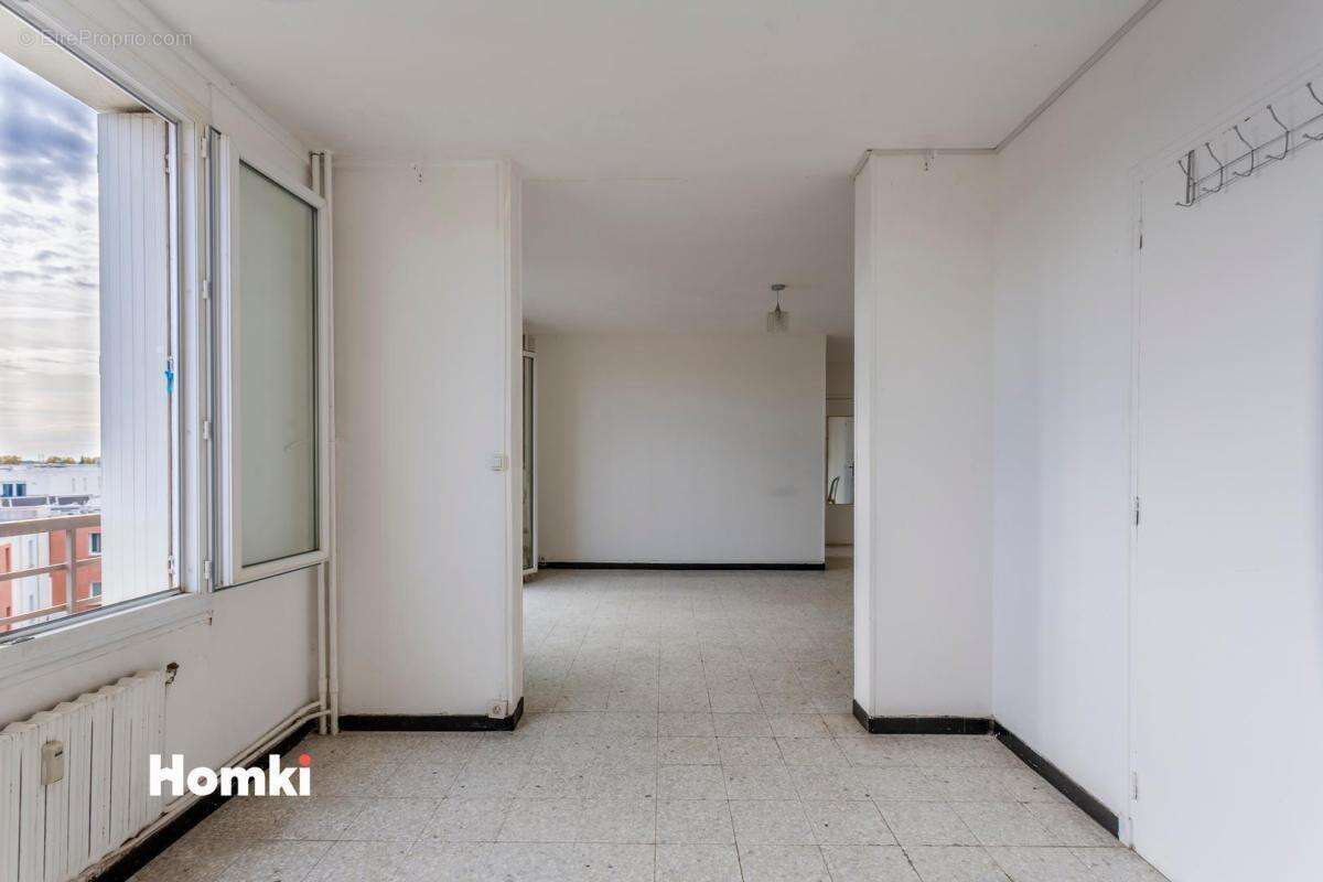 Appartement 3 pièces de 69m2 avec parking et vue à Nîmes Jean-Jaurès - photo 9