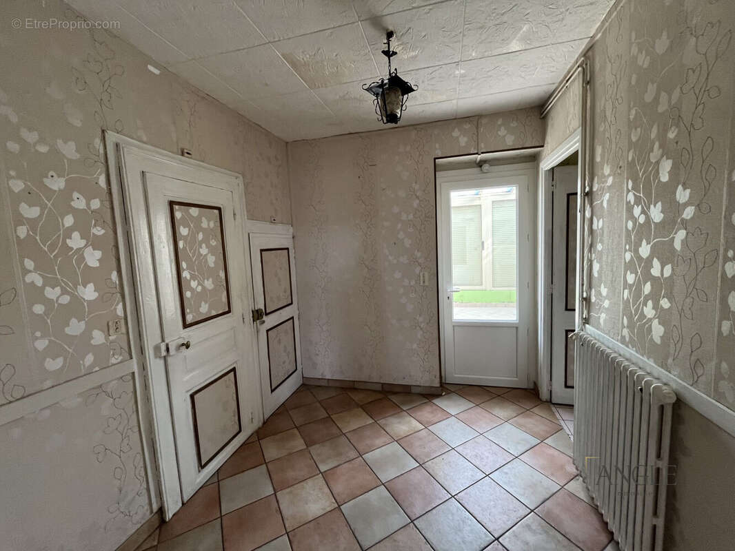 Maison 100 m² à Arconnay  - photo 7