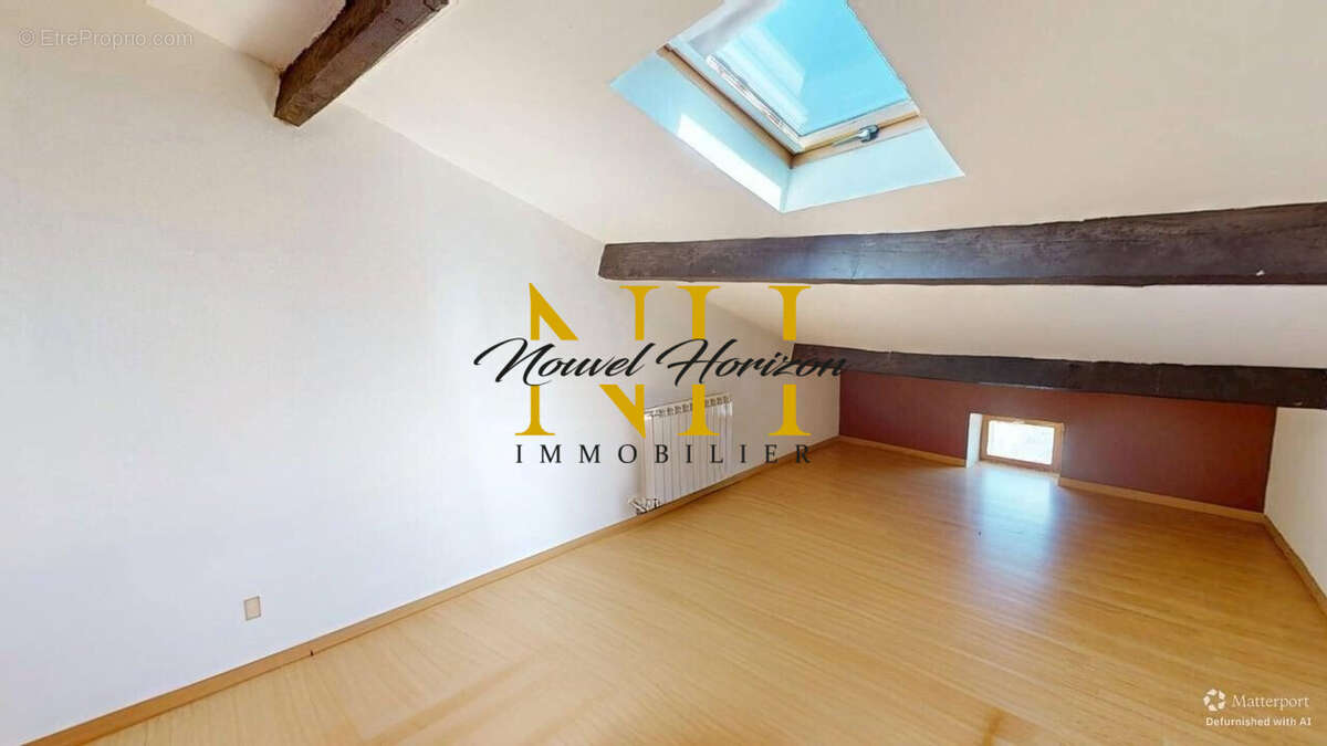 Chambre 1 T3 - Appartement à SAINT-MARTIN-LA-PLAINE