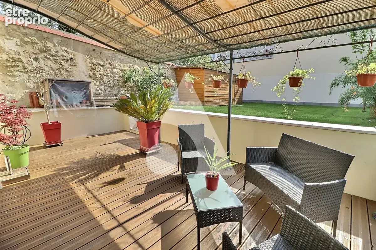 Maison de ville avec jardin et parking en plein centre-ville - photo 10