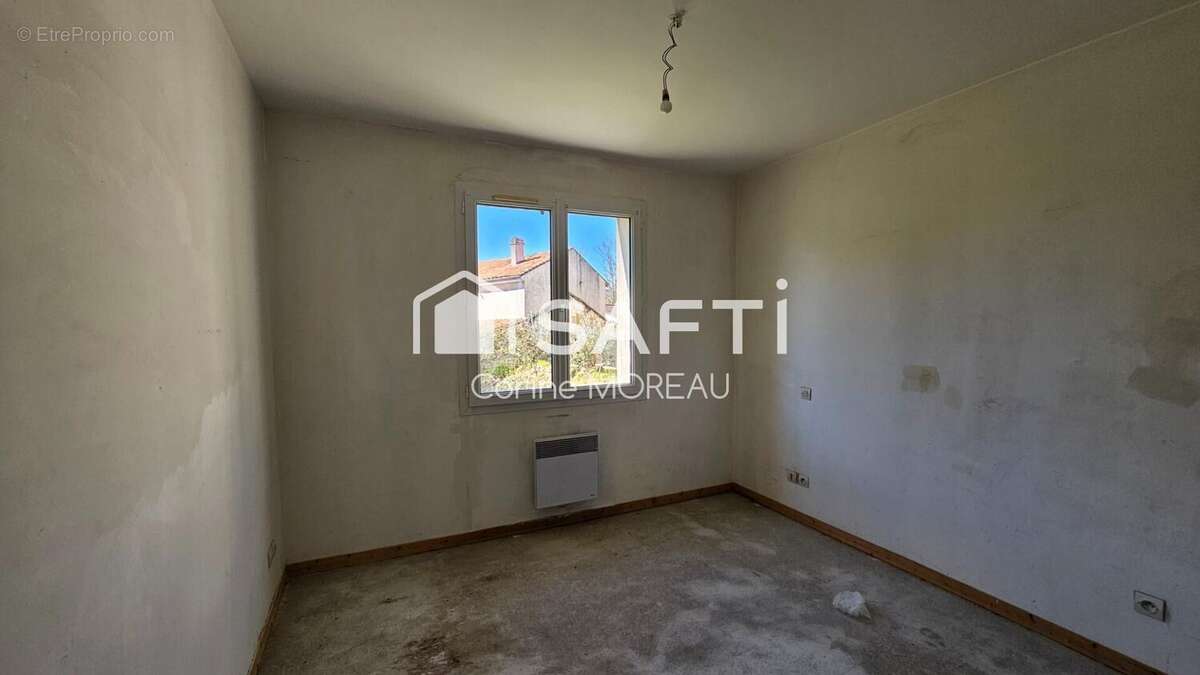 Photo 9 - Maison à RUELLE-SUR-TOUVRE