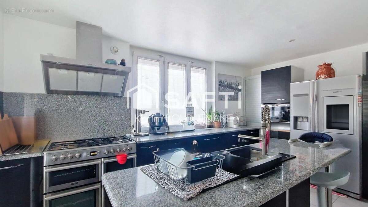 Photo 2 - Maison à ASNIERES-SUR-OISE