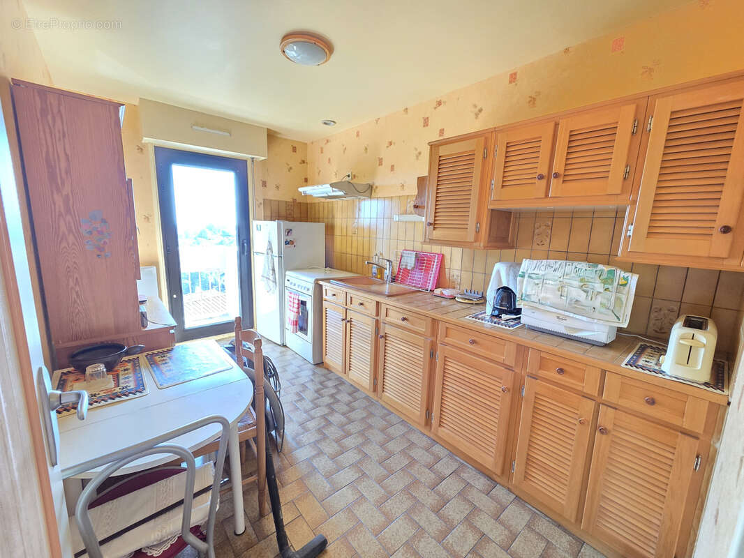 Appartement T3 64 m2 balcon cave et parking - photo 2