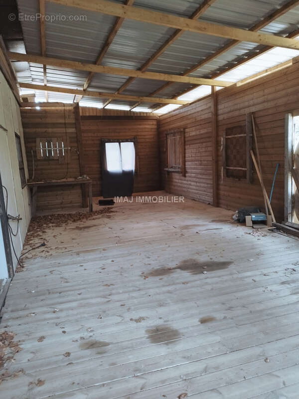 Terrain de loisir boise de 7000 m2 - proche epinal - avec chalet de loisir a renover - photo 3