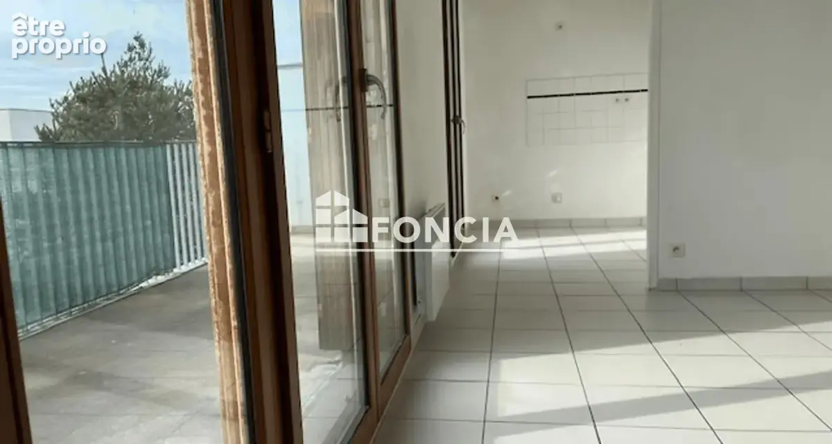 Appartement type 3 en duplex avec balcon et parking privatif en sous-sol - photo 2