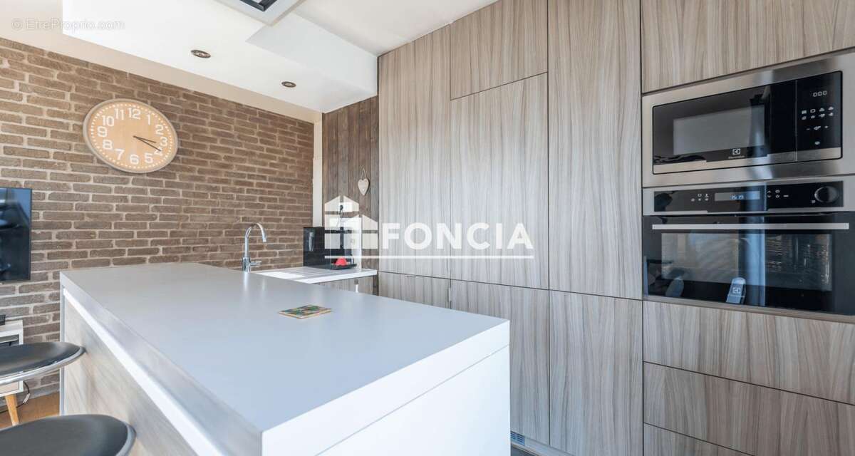 Appartement coup de cœur – Dernier étage avec exceptionnelle terrasse de 45 m² ! - photo 7