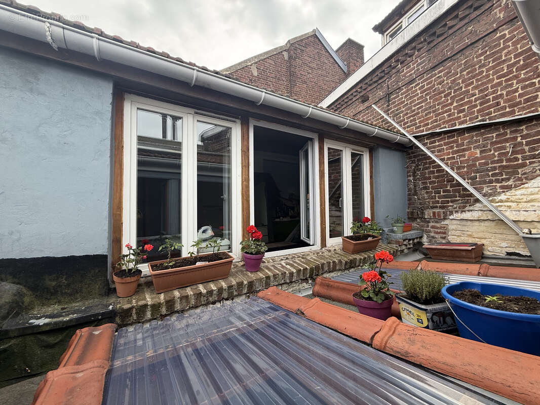 Immeuble de rapport 3 lots et hangar - photo 5