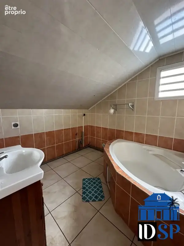 Maison 5 pièces 140 m² à vendre à Saint-Paul (97411) - photo 6