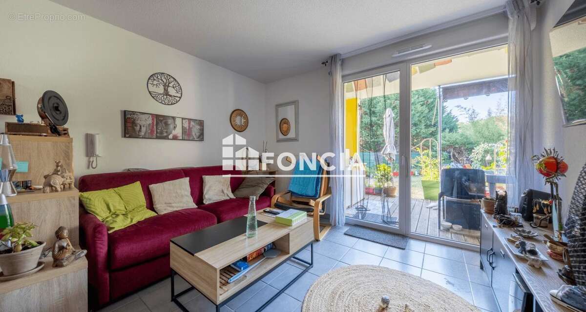 Appartement T2 en RDJ avec parking - photo 5