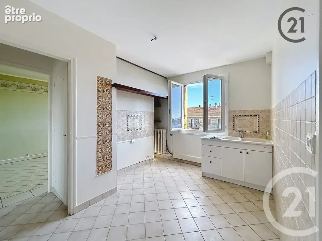 Appartement 4 pièces 59 m² à vendre à La Chapelle-Saint-Luc (10600) - photo 6