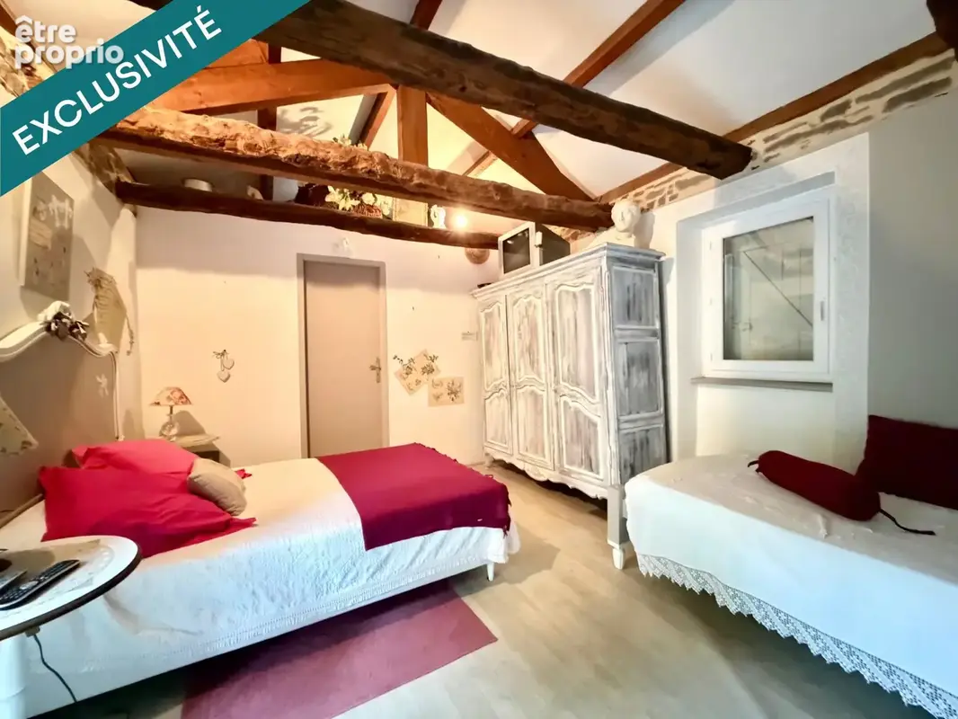 Photo 1 - Maison à SAINT-VICTOR-ET-MELVIEU