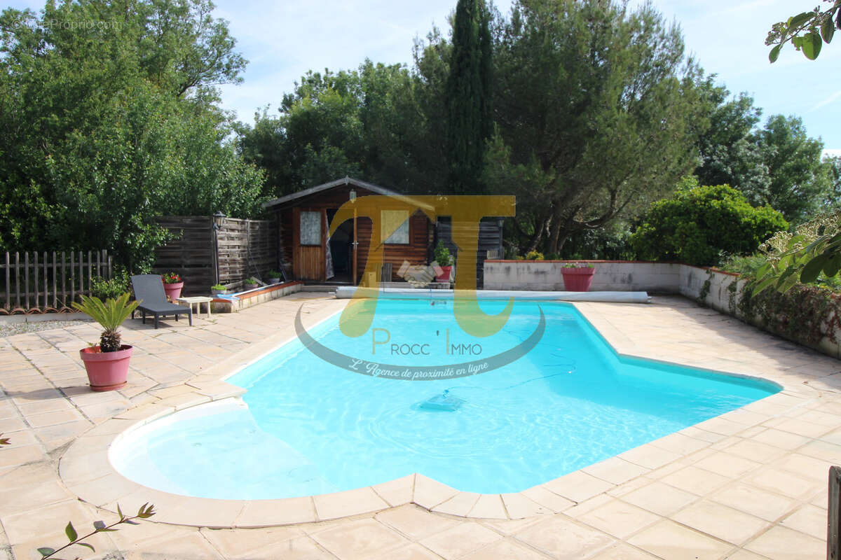 Grande maison en pierre avec piscine , intégrant un gîte 4 places - Par arboré de 2 hectares. - photo 2