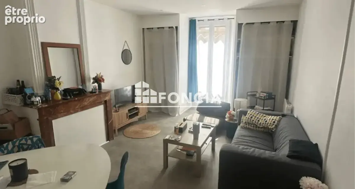 Romans-sur Isère - Immeuble  144 m2 - 2 appartements  et un local commercial - photo 4