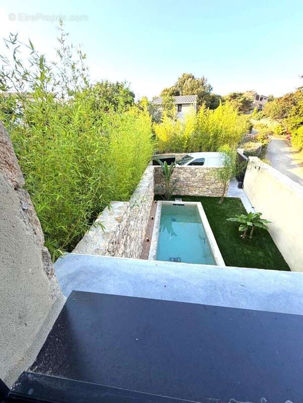 Superbe maison de caractère neuve à 20 minutes d'Uzès Vue panoramique, piscine et cadre de vie exceptionnel ! - photo 10