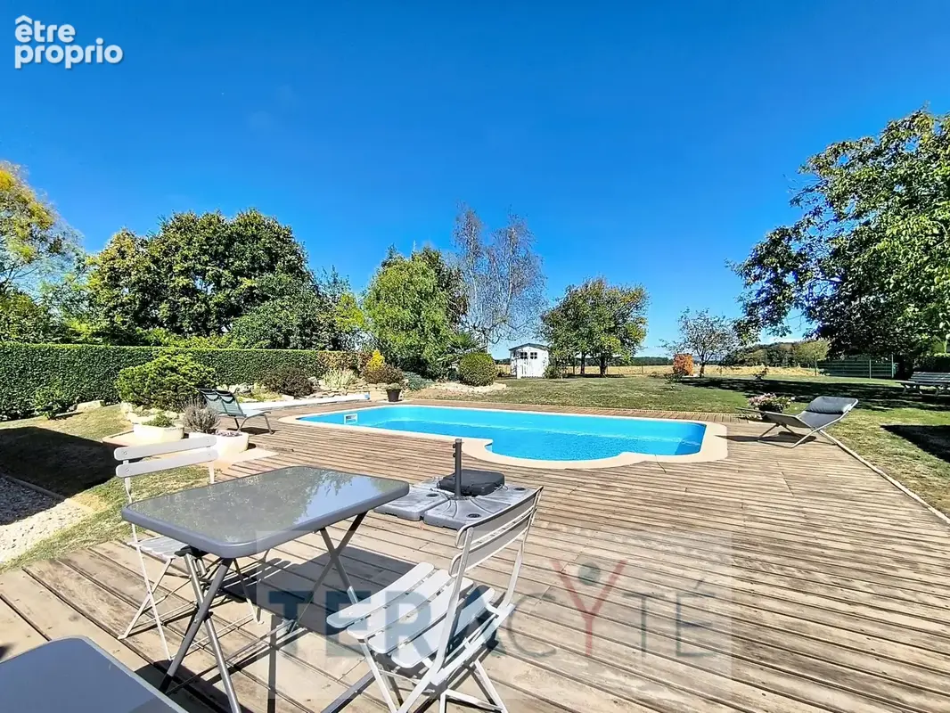 Maison 5 pièces 132 m² à vendre à Polliat (01310) - photo 3