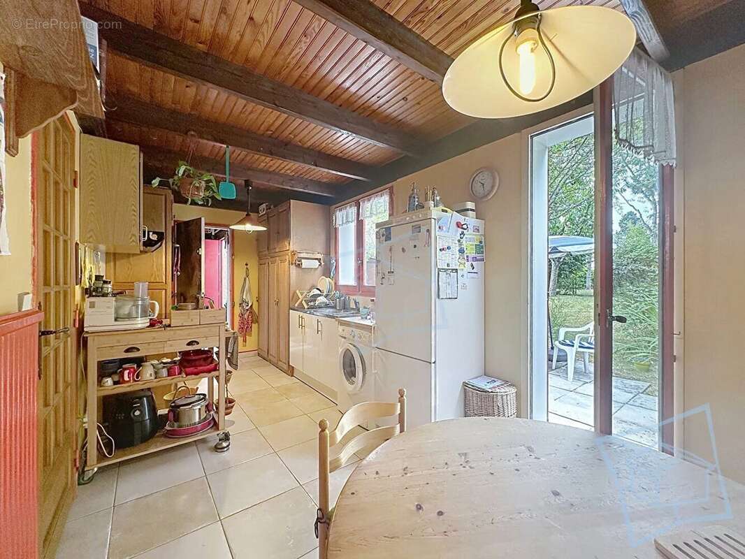 Maison Voisins Le Bretonneux 5 pièce(s) 103 m2 - photo 2