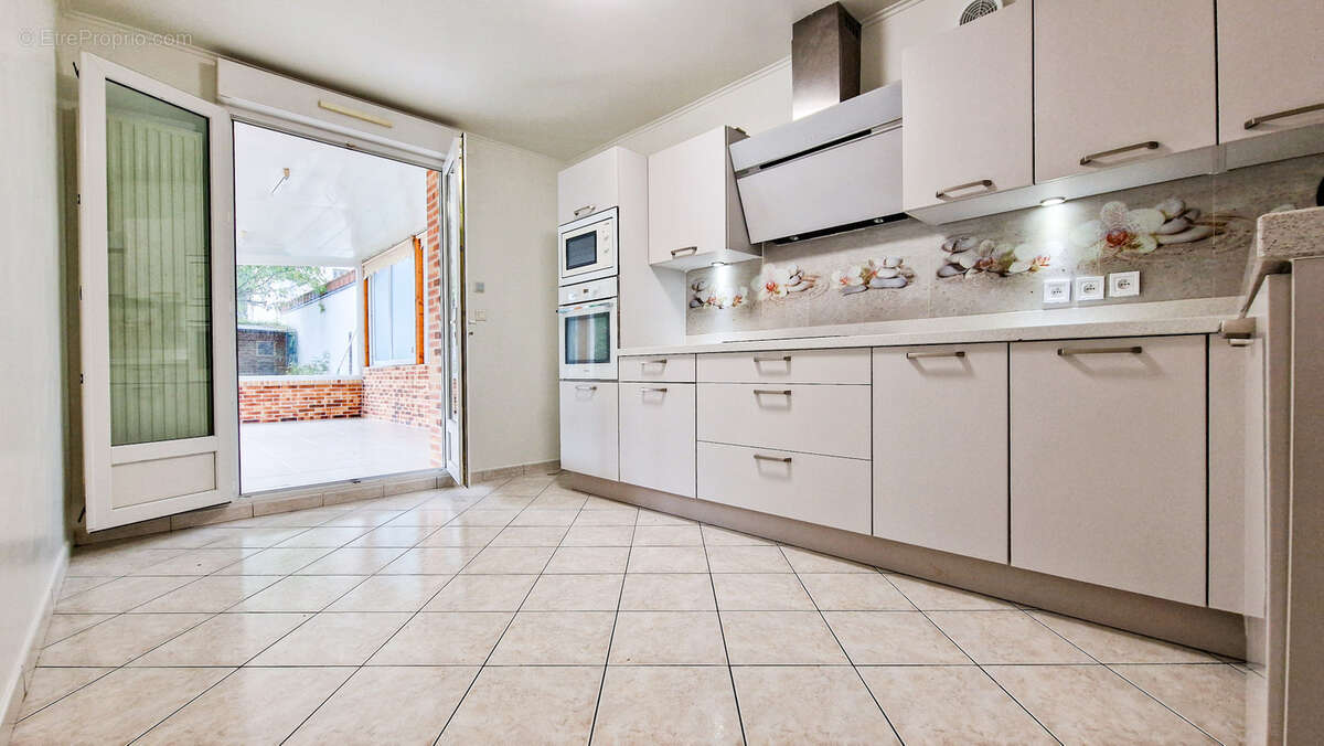 Maison à SARTROUVILLE