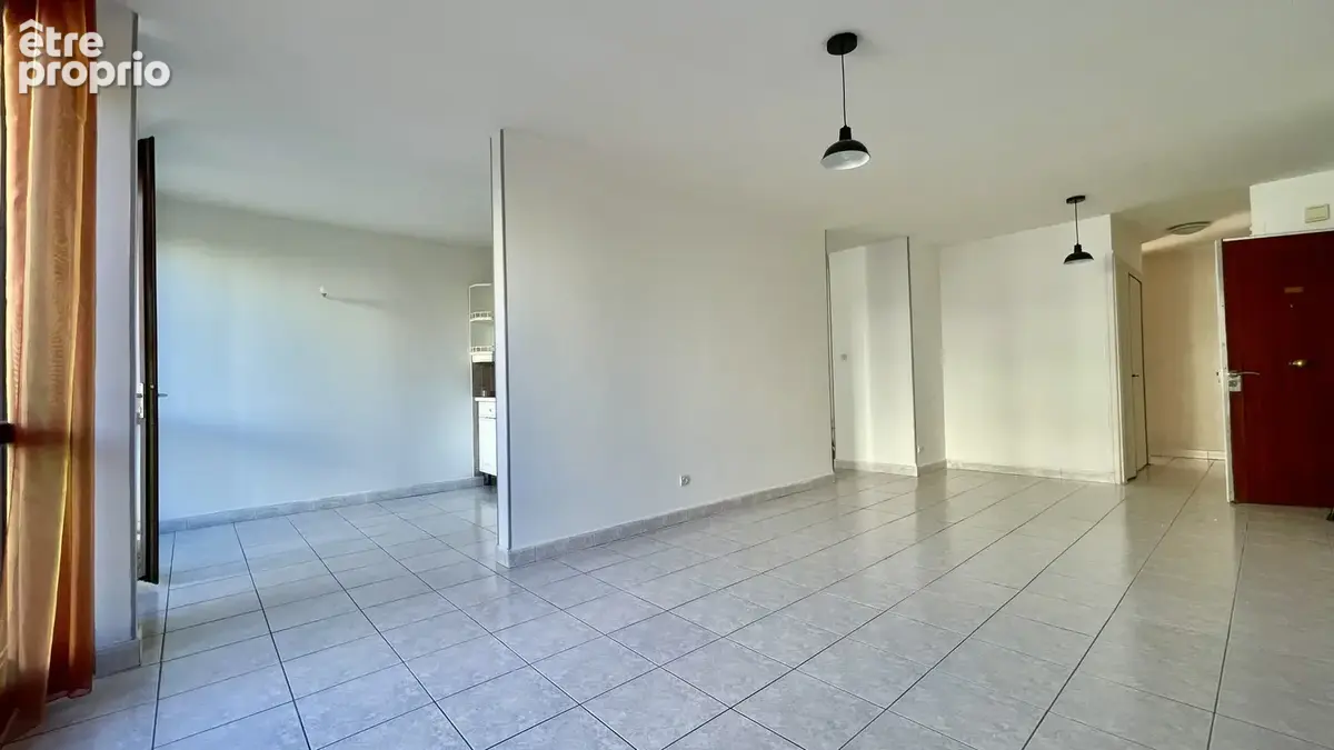 Spacieux T4 de 82 m2 traversant Est/Ouest avec balcon, garage et cave   DPE D - photo 3