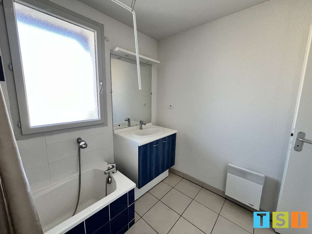 Montréjeau : Appartement T2 avec balcon, terrasse et place de parking sécurisée - photo 7