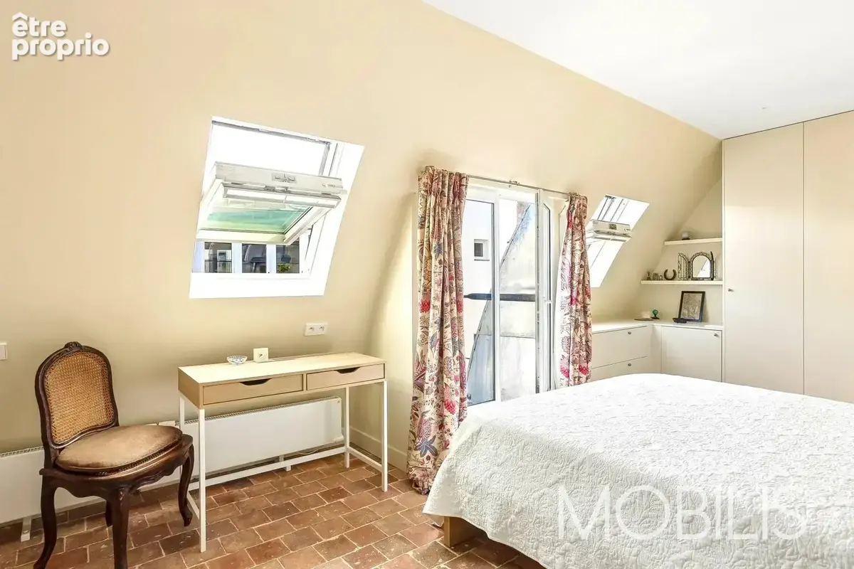 75002 montorgueil - appartement 76,74m2 au sol (65,01m2 carrez) dernier étage - ascenseur - 2 balcons - calme absolu - 1 chambre - photo 9