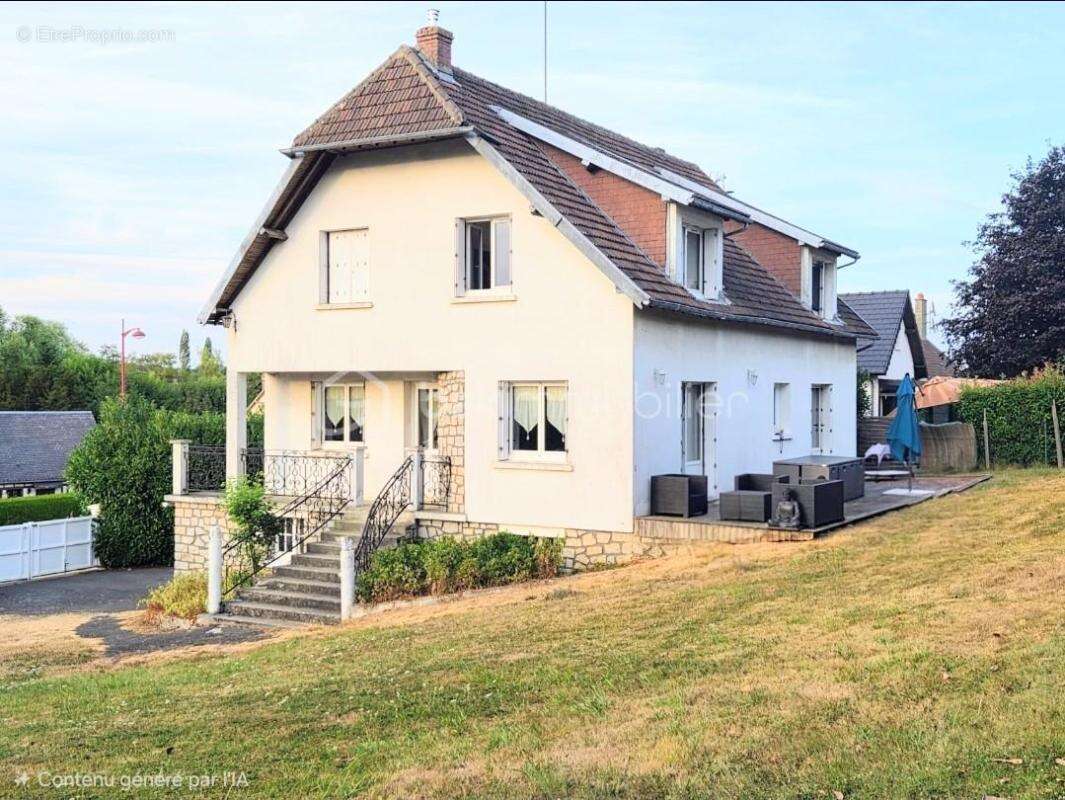Une maison aux nombreux atouts, offrant espace, luminosité et une terrasse à aménager - photo 11