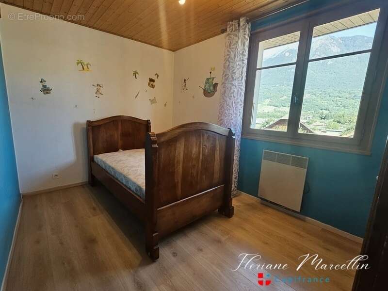 Maison avec 2 appartements indépendants - VOUGY (74) - photo 14