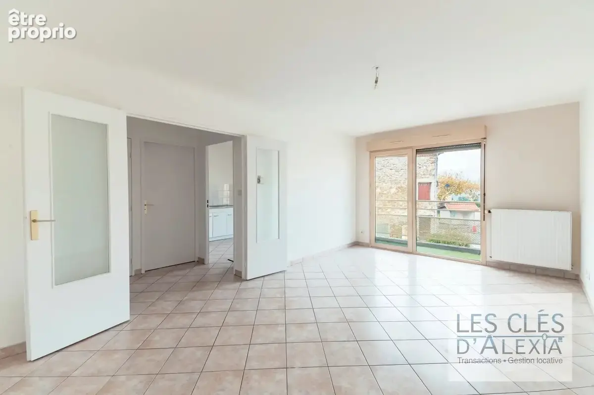 Appartement T3 avec cave, garage et balcon lumineux - photo 2