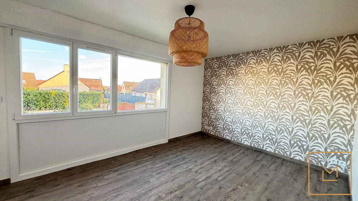 Appartement à CORMELLES-LE-ROYAL