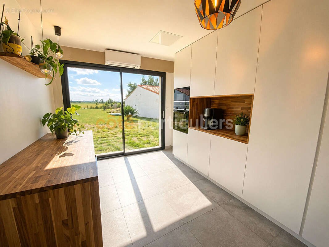 Ensemble immobilier sur un terrain de plus 2000m²  - 5 pièces - photo 2
