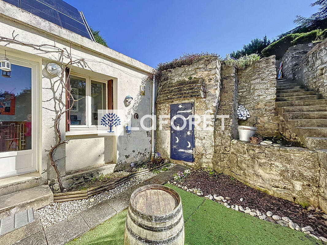 Maison à THIVERVAL-GRIGNON