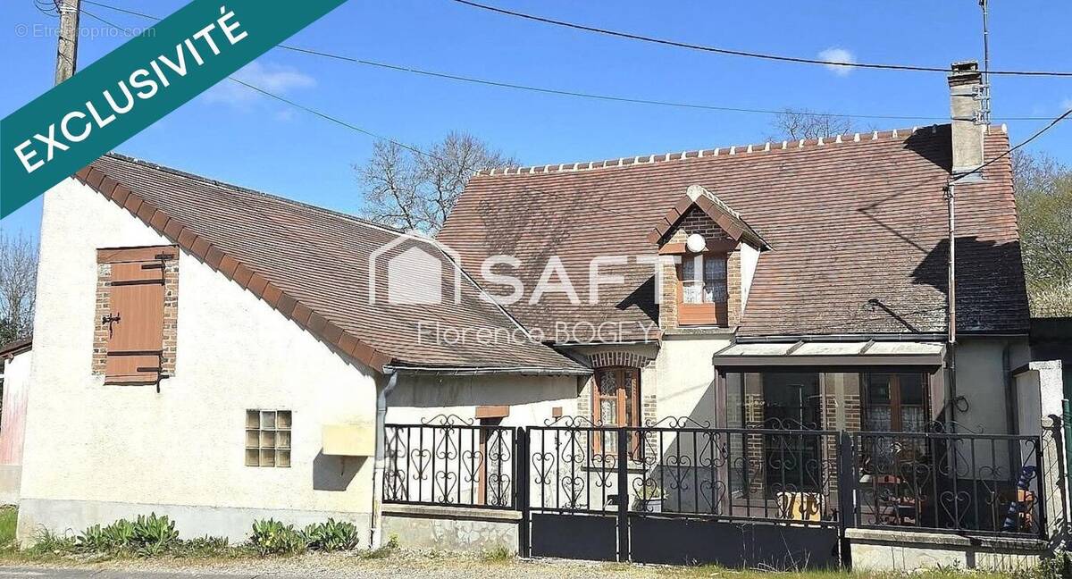 Photo 1 - Maison à LUSSAC-LES-EGLISES
