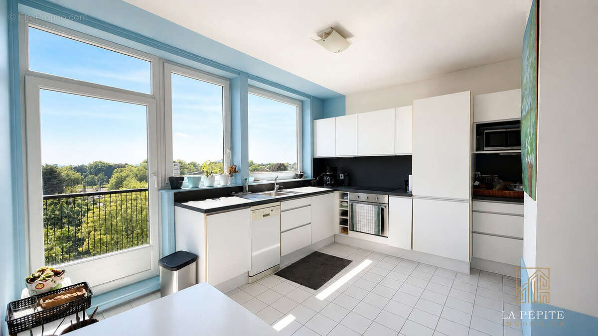 Appartement t4 tranformé en t3 avec garage, cave et vue panoramique - photo 11