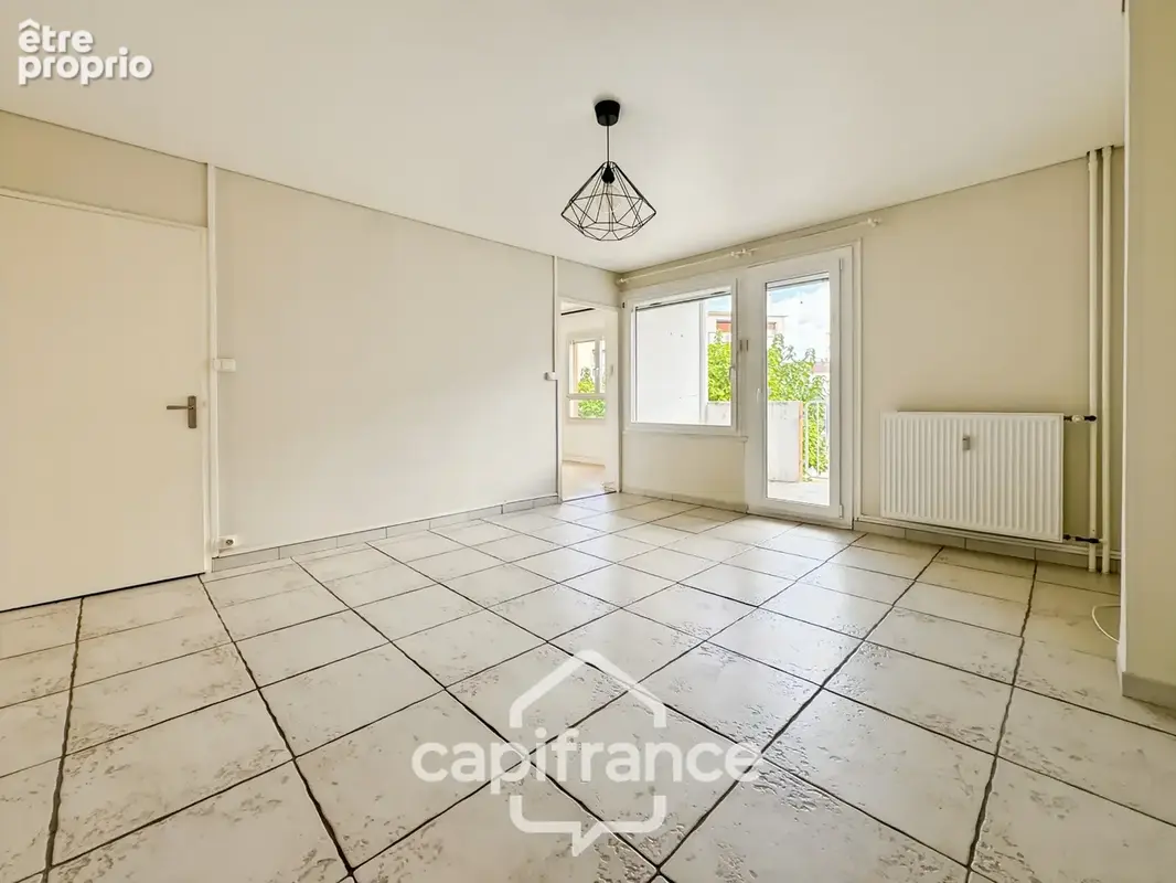 Appartement T4 67 m² – 3 chambres – Balcon – Garage – Cave – Chalon-sur-Saône - photo 4