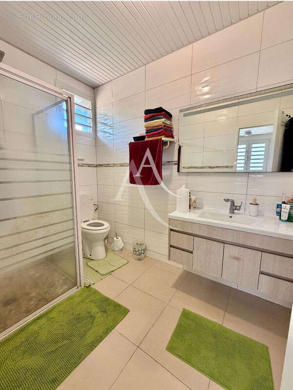 En EXCLUSIVITE: maison T4 + dépendance avec piscine au VAUCLIN. - photo 17
