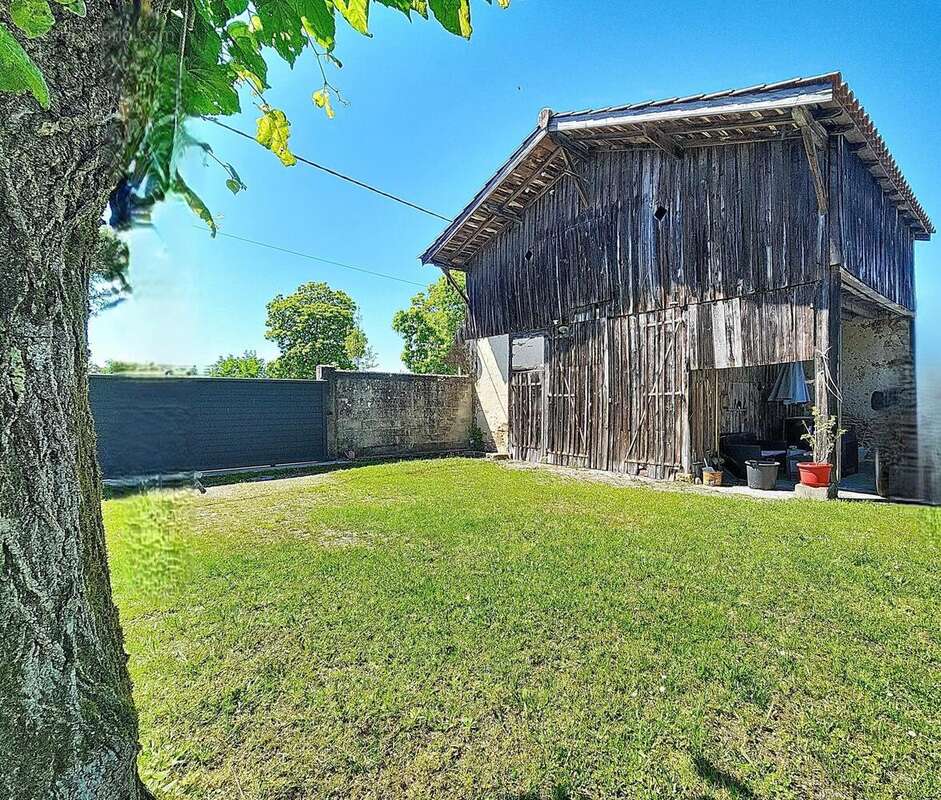 Photo 2 - Maison à SAINT-SYMPHORIEN