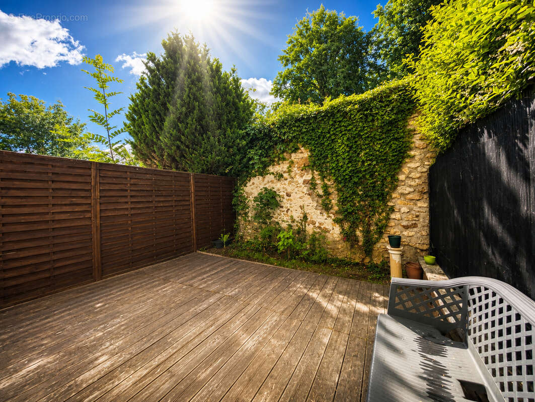 Maison 4 pièces de 100m2 avec 3 chambres et un jardin - photo 11