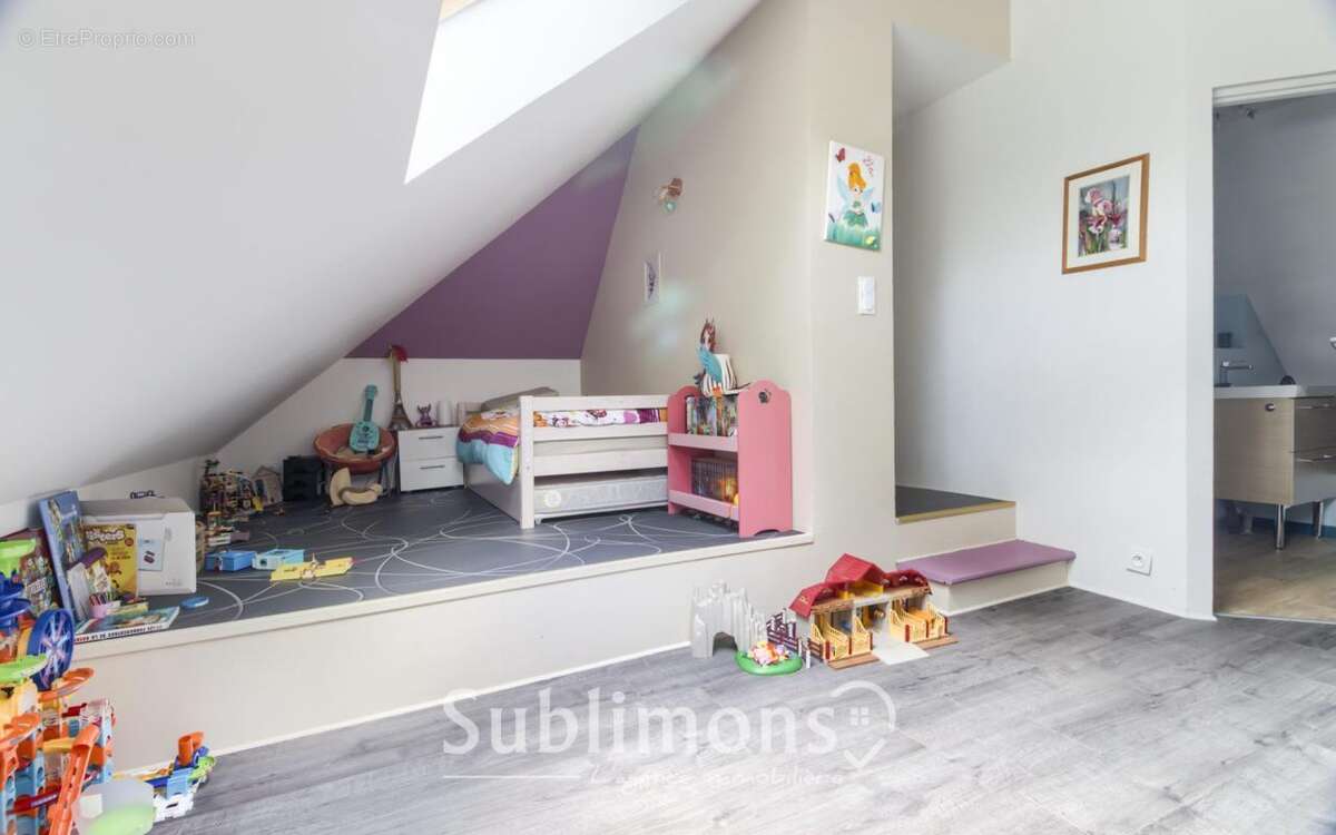 Maison à GRAND-CHAMP