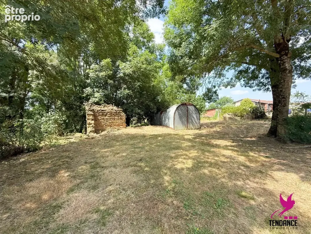 Joli Terrain diffus et arboré de 1100 m². - photo 2