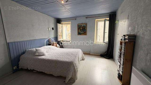 PUISSERGUIER - Maison de caractère avec terrasse et beau potentiel d'aménagement - photo 7