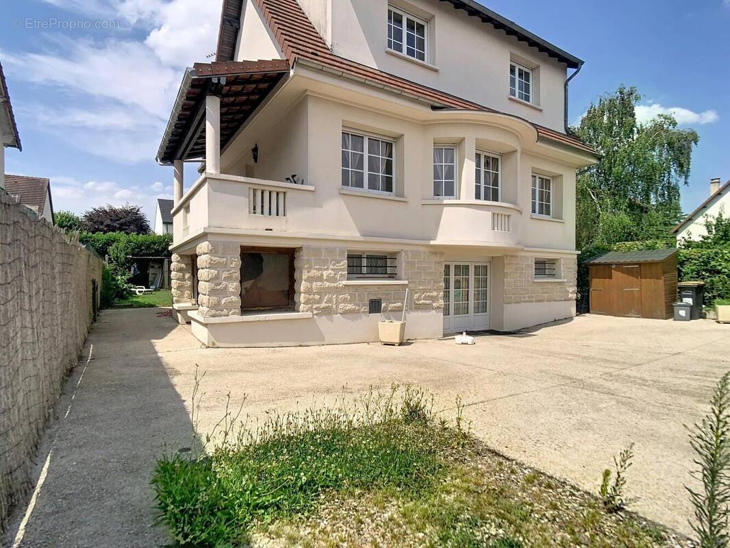 Photo 1 - Maison à LE PLESSIS-TREVISE