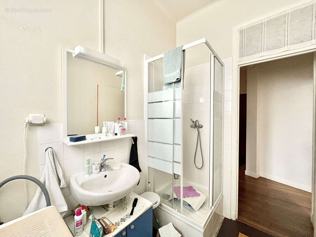 A VENDRE appartement loué à Caen 2 pièce(s) 55.18 m2 - Lumineux - quartier prisé - grand salon séjour - photo 14